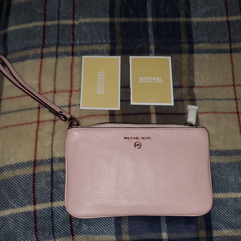 Michael Kors pink pebble leather zipper wristlet.  New without tags.